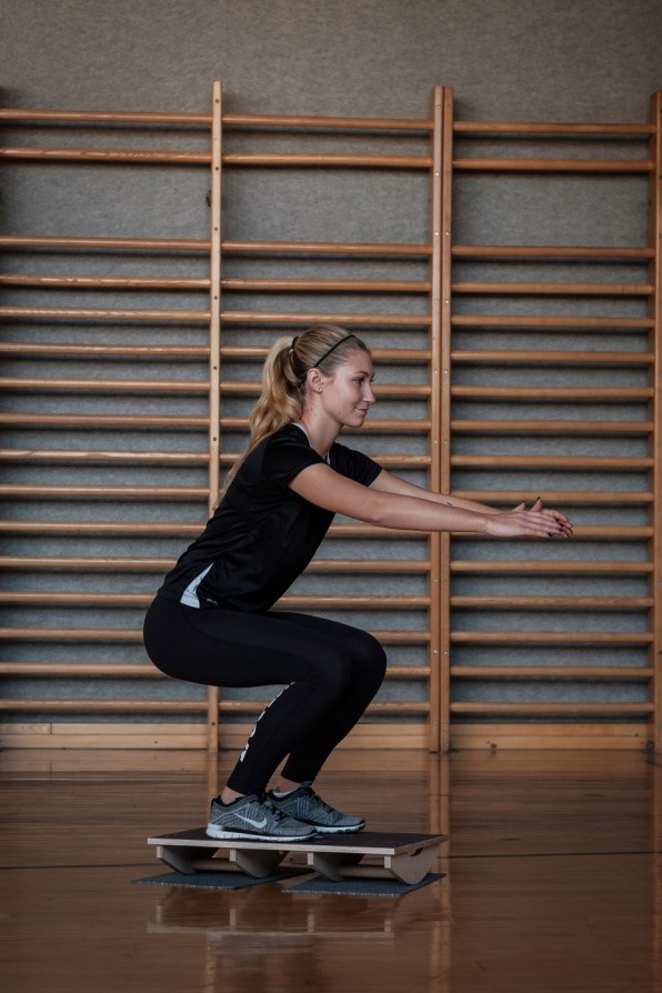 Kniebeuge aus dem Wackelbrett