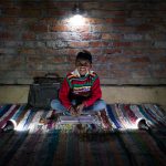 Eight-year-old Alam studying with the help of the solar lights. "We had to take turns to study as the light from our kerosene-powered lamps was insufficient for us five siblings. The dim light caused eye irritation due to smoke emitted and was straining to the eye. Studying for examinations was the most challenging part," says Farzana, Alam's sister. "We go to our friend's house to play carrom, snake and ladder games in the night. Since the solar bulbs are very luminous, all my siblings can study together and my grades have improved," he says. Alam aspires to become a school teacher so that he can brighten up the lives of the less fortunate in his community. Summary: Solar bulbs provided by World Vision have provided a new way of life to more than 400 families in Sambhal, Uttar Pradesh, India. Daily activities have extended into the evenings by about six hours and families such as Farzana's are experiencing much more productivity. Project/ADP Name: Moradabad ADP