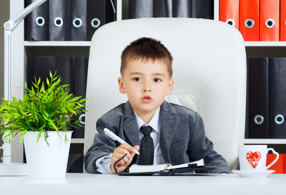 Little,Boy,As,A,Businessman,,In,Office