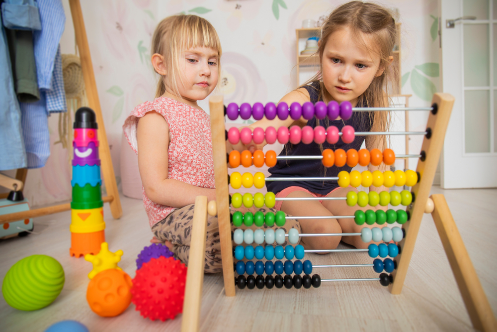 Little,Children,In,Kindergarten,Learn,To,Count,On,Abacus,,Bright
