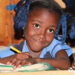 A smiling child at school