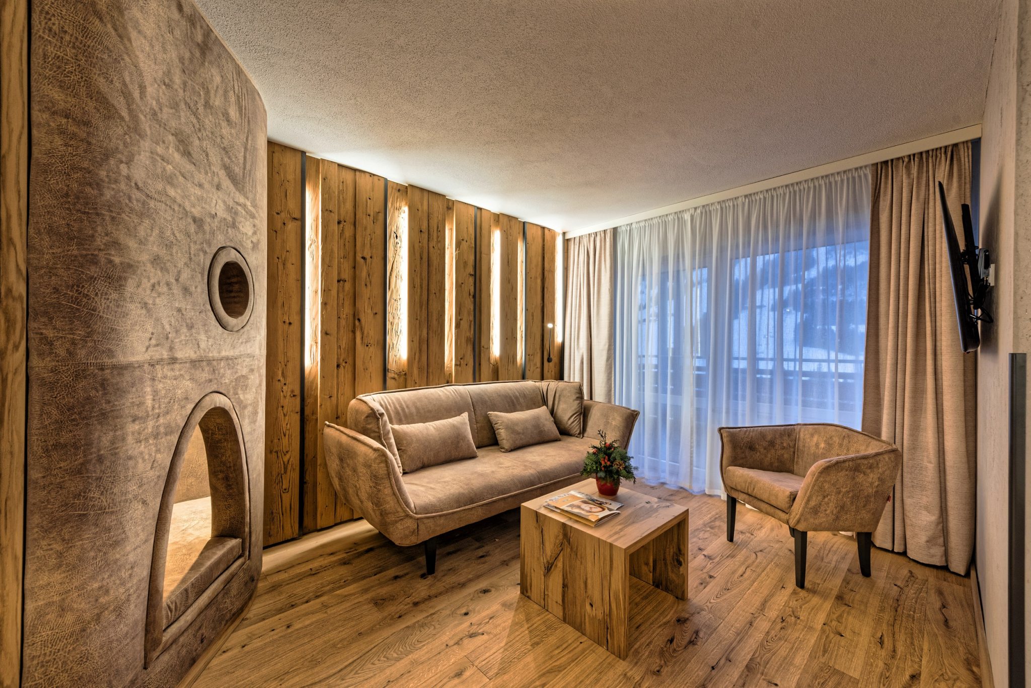 wohnbereich_der_familiensuite_oberjoch_-_familux_resort