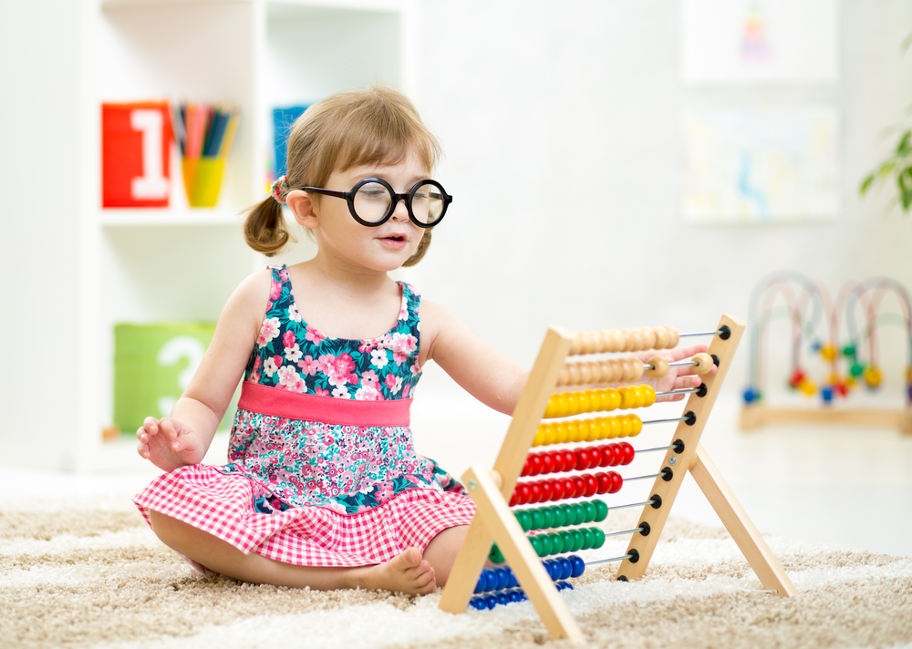 Child,Kid,Weared,Glasses,Playing,With,Abacus,Toy,Indoor