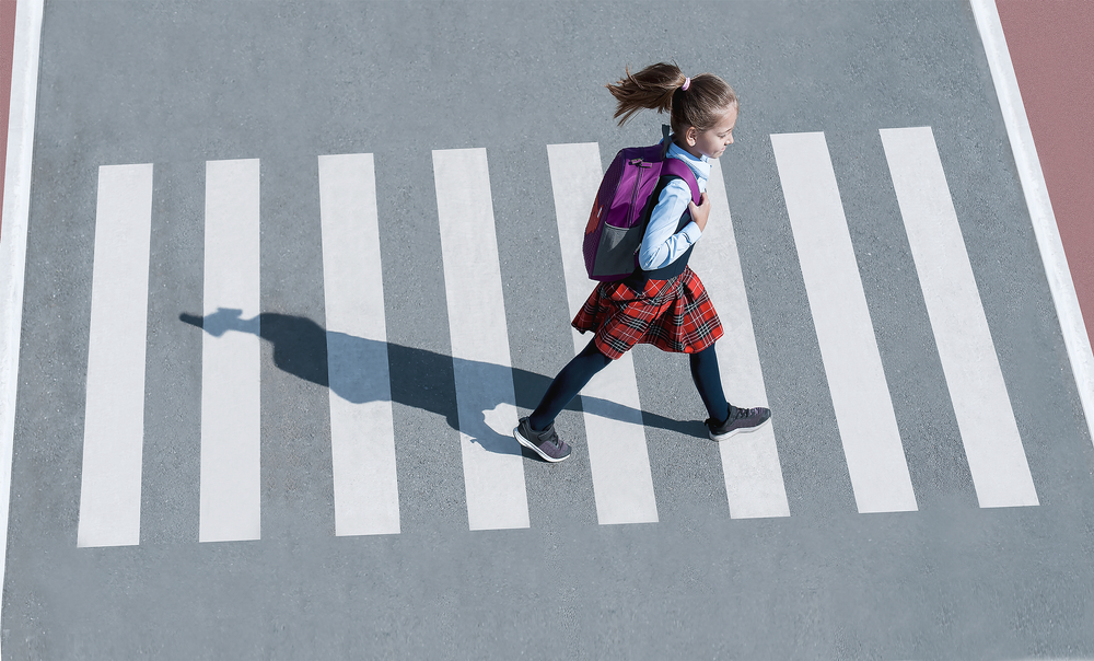 Schoolgirl,Crossing,Road,On,Way,To,School.,Zebra,Traffic,Walk