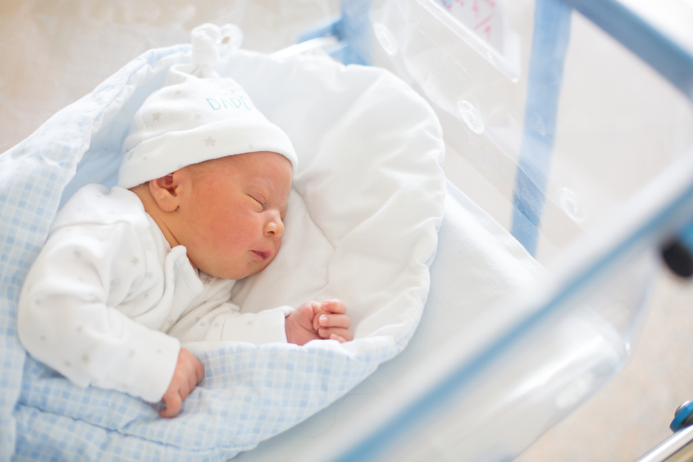Beautiful,Newborn,Baby,Boy,,Laying,In,Crib,In,Prenatal,Hospital