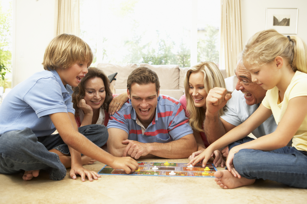 Family,Playing,Board,Game,At,Home