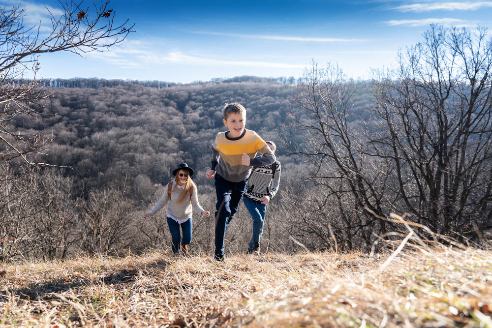 Beautiful,Young,Family,With,A,Baby,Son,Sitting,Walking,Together