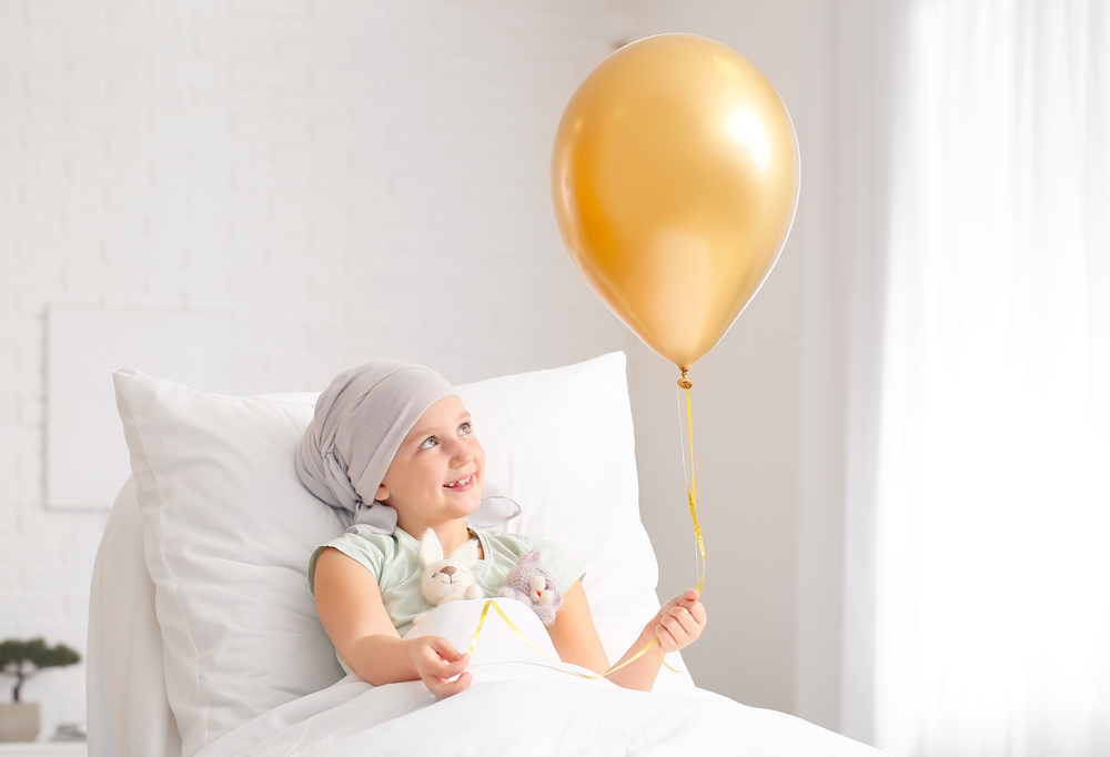 Little,Girl,With,Golden,Balloon,Undergoing,Course,Of,Chemotherapy,In