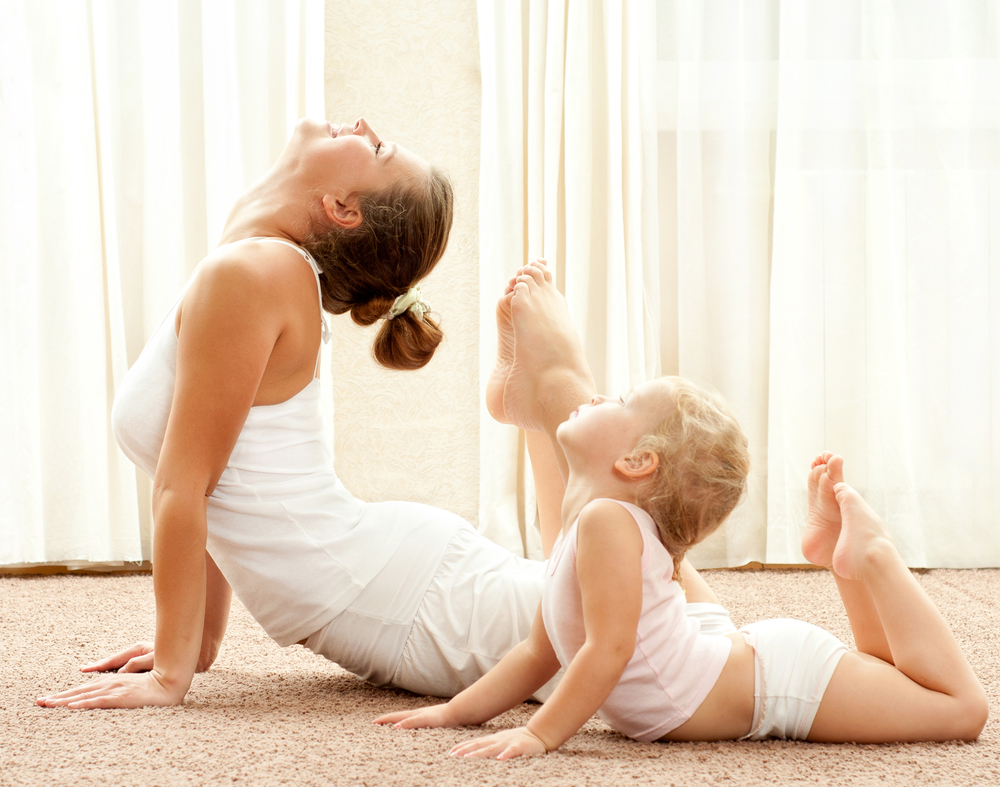 Mother,And,Daughter,Doing,Exercise,Home
