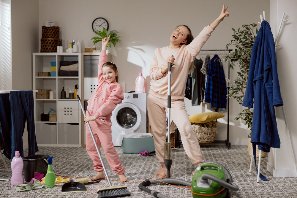 Cheerful,Mother,And,Daughter,Spend,Time,Together,While,Cleaning,House.