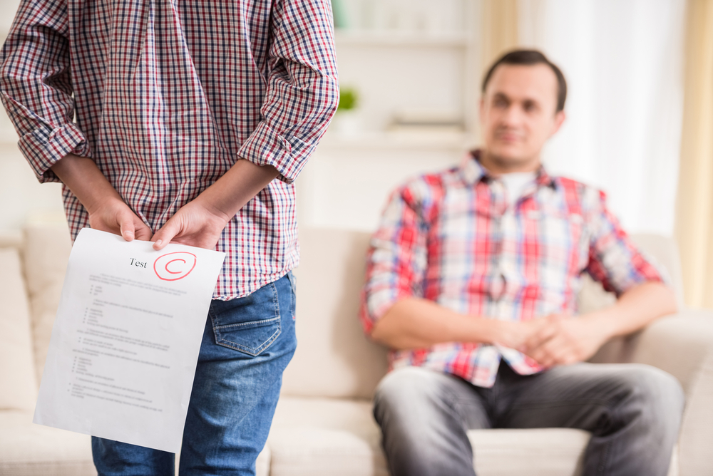 Boy,Hiding,Behind,The,Back,Bad,Test,Result.