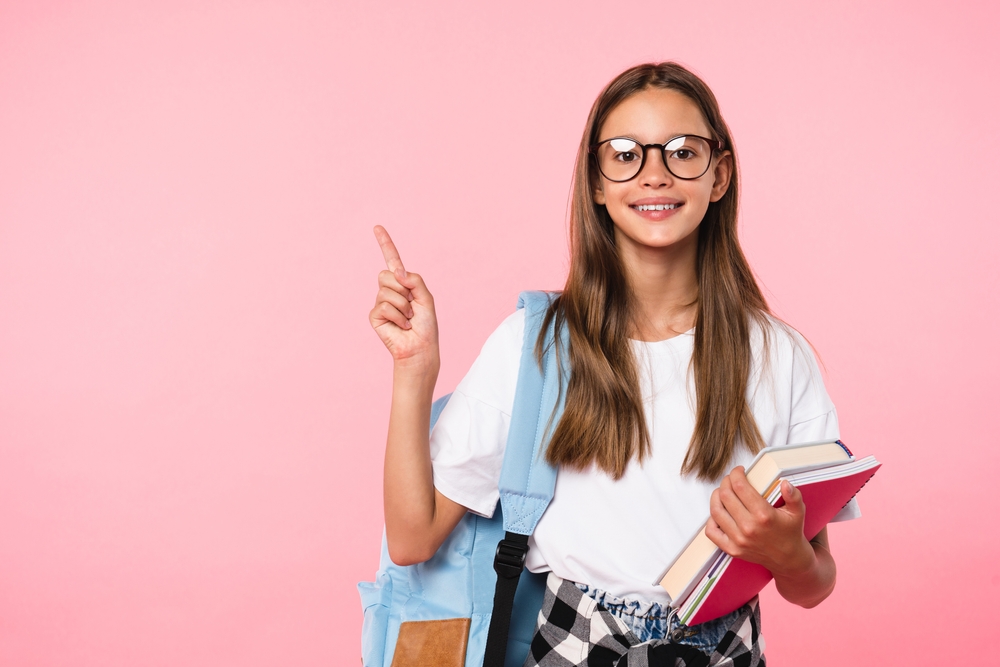 Excellent,Best,Student,Schoolgirl,Pointing,With,Her,Fingers,Showing,Copy