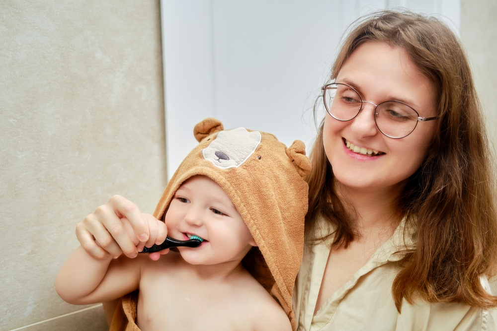 A,Mother,Woman,And,A,Happy,Toddler,Baby,Brush,Their